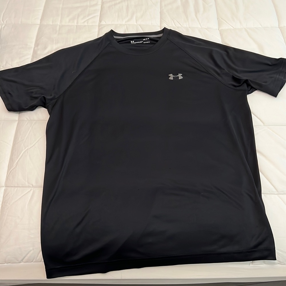 Under Armour L Athletic material T shirt- Used condition.